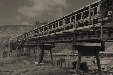 Elevated conveyor gallery on a bulk-materials site